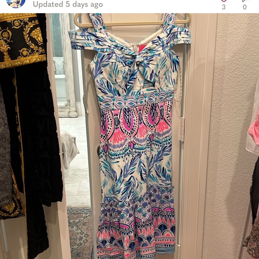 Lily Pulitzer dress with seam undone at arm pit.